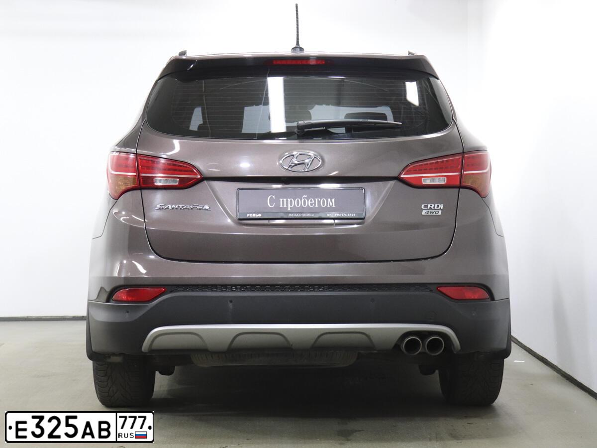 Фото автомобиля HYUNDAI SANTA FE, 2013 — госномер С145КТ790. Цвет: Коричневый