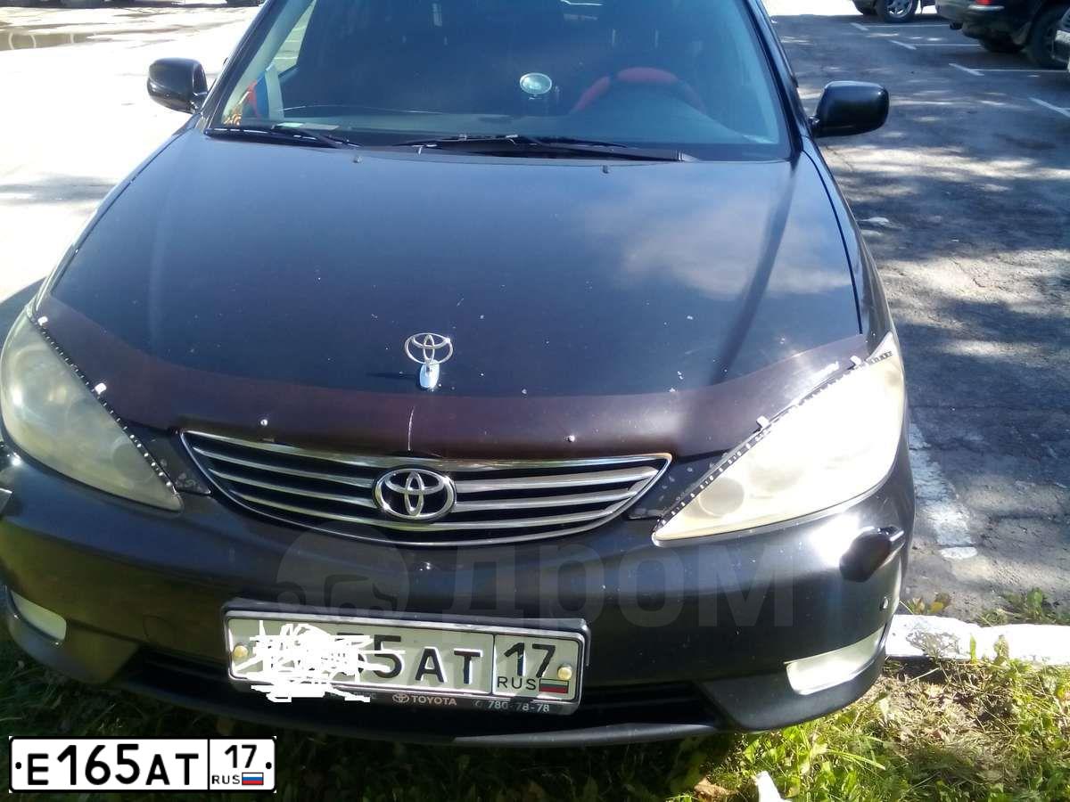 Фото автомобиля LADA 2107, 2010 — госномер Е165АТ17. Цвет: СИНЕ-ЗЕЛЕНЫЙ
