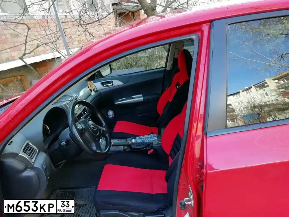 Фото автомобиля SUBARU IMPREZA, 2008 — госномер Е726АВ761. Цвет: Красный