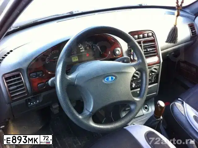 Фото автомобиля LADA 2112, 2006 — госномер Т043РС72. Цвет: СЕРО-ЗЕЛЕНЫЙ