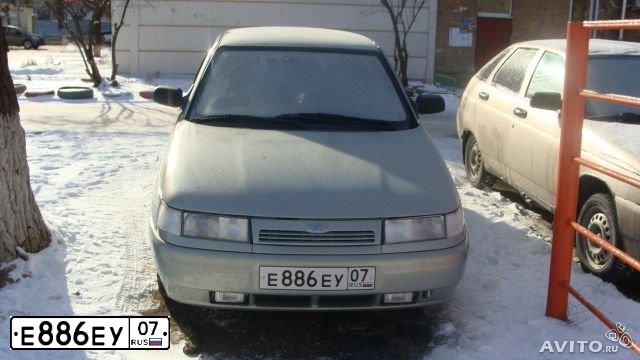 Фото автомобиля LADA 2110, 2002 — госномер С460ЕО761. Цвет: СЕРЕБРИСТЫЙ ЖЕЛТО-ЗЕЛЕНЫЙ