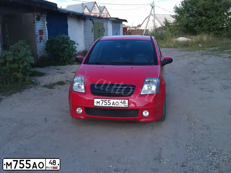 Фото автомобиля CITROEN C2, 2007 — госномер М755АО48. Цвет: ТЕМНО-КРАСНЫЙ