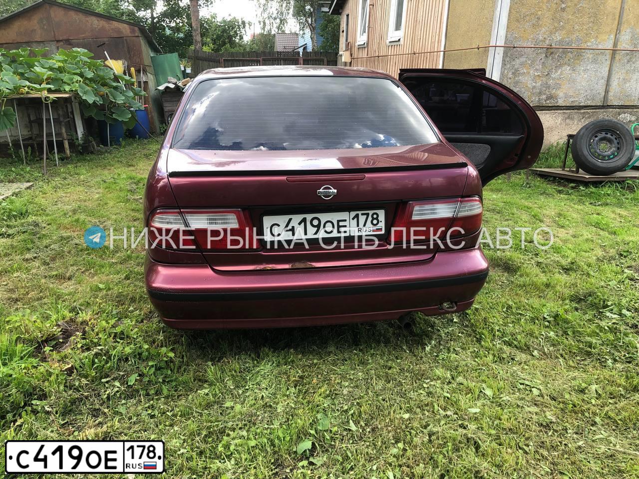 Фото автомобиля NISSAN ALMERA, 1998 — госномер С419ОЕ178. Цвет: Красный (вишневый)