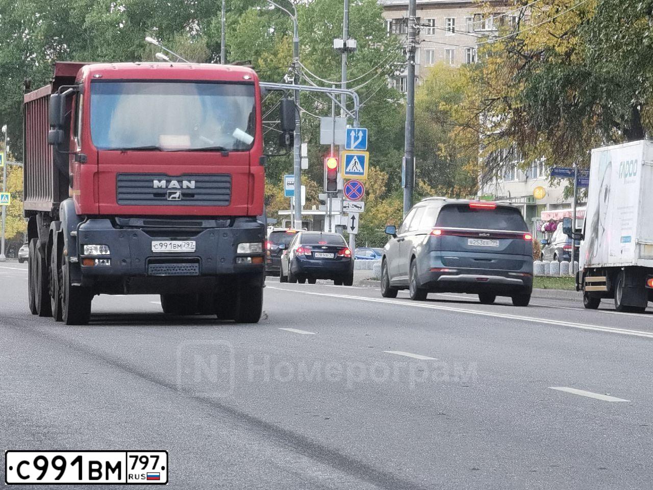 Фото автомобиля MAN TGA 41.XXX /8X4/, 2008 — госномер С991ВМ797. Цвет: Красный