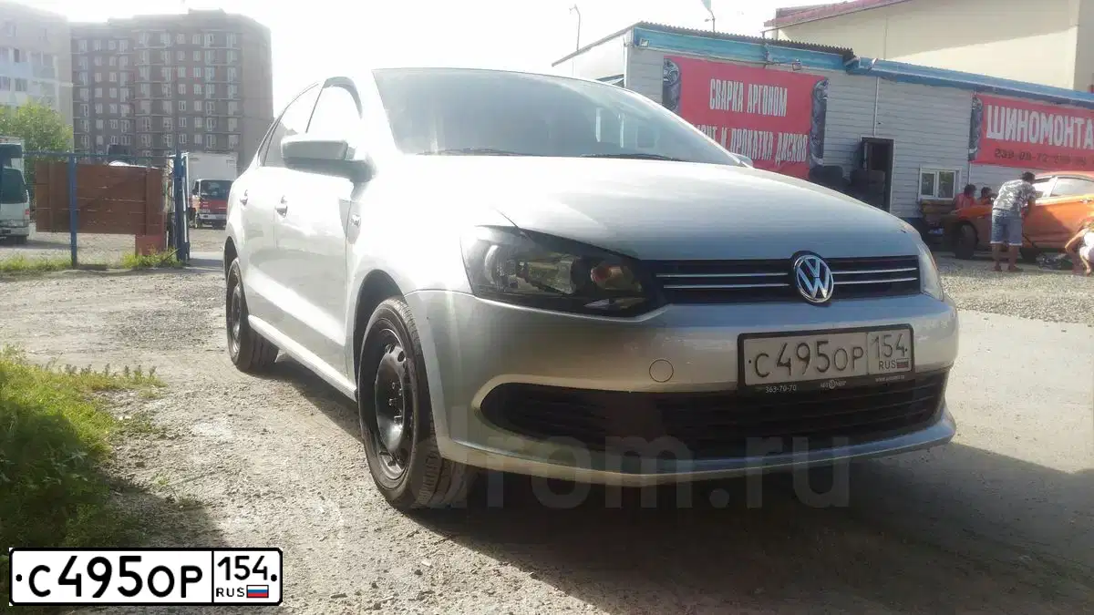Фото автомобиля VOLKSWAGEN POLO, 2014 — госномер Н926СА154. Цвет: СЕРЕБРИСТЫЙ