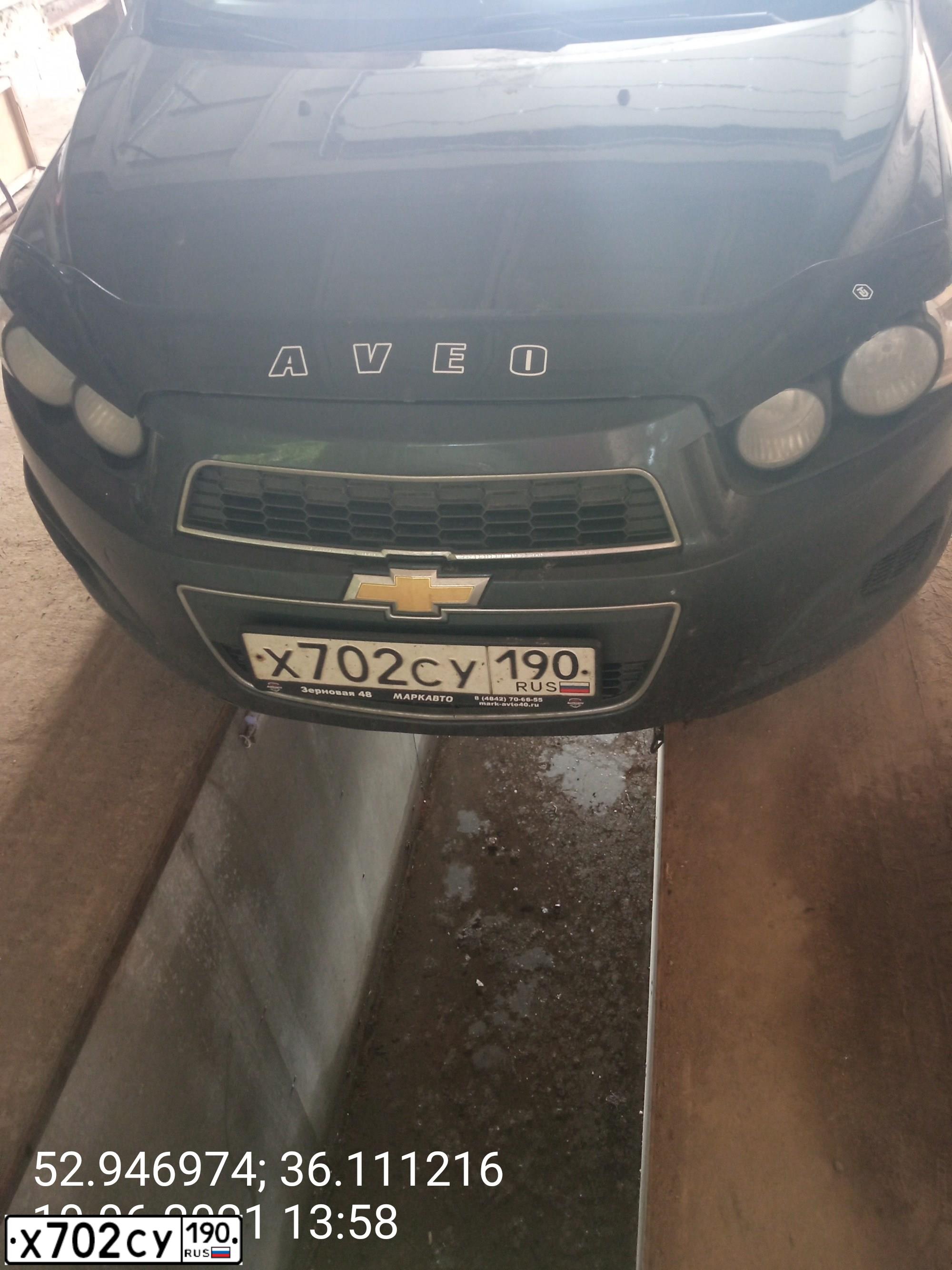 Фото автомобиля CHEVROLET AVEO, 2012 — госномер С352МО57. Цвет: ЧЕРНЫЙ