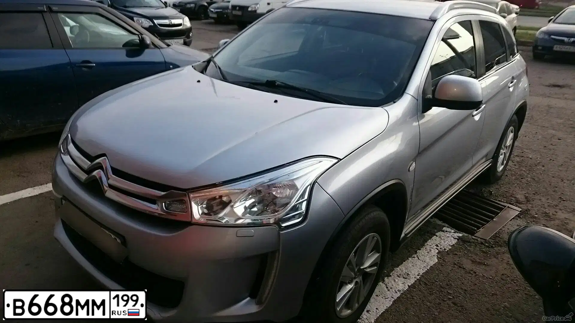 Фото автомобиля CITROEN C4 AIRCROSS, 2012 — госномер Р900ХВ174. Цвет: Серебристый