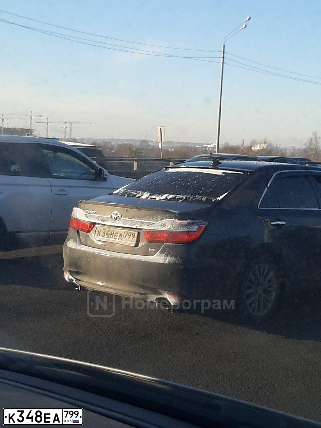 Фото автомобиля TOYOTA CAMRY, 2017 — госномер К348ЕА799. Цвет: ЧЕРНЫЙ МЕТАЛИК