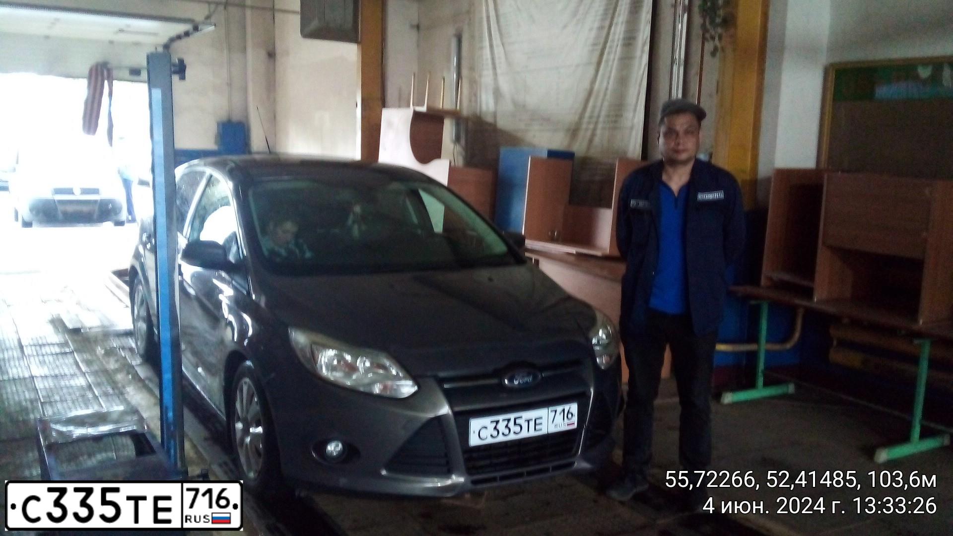 Фото автомобиля FORD FOCUS, 2013 — госномер С335ТЕ716. Цвет: СЕРО-КОРИЧНЕВЫЙ
