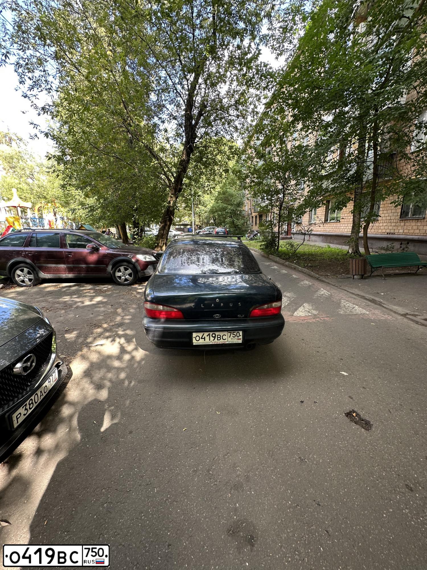 Фото автомобиля KIA CLARUS, 1998 — госномер О419ВС750. Цвет: СИНИЙ ТЕМНЫЙ