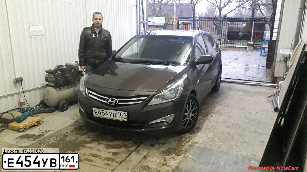 Фото автомобиля HYUNDAI SOLARIS, 2015 — госномер Е454УВ161. Цвет: Коричневый