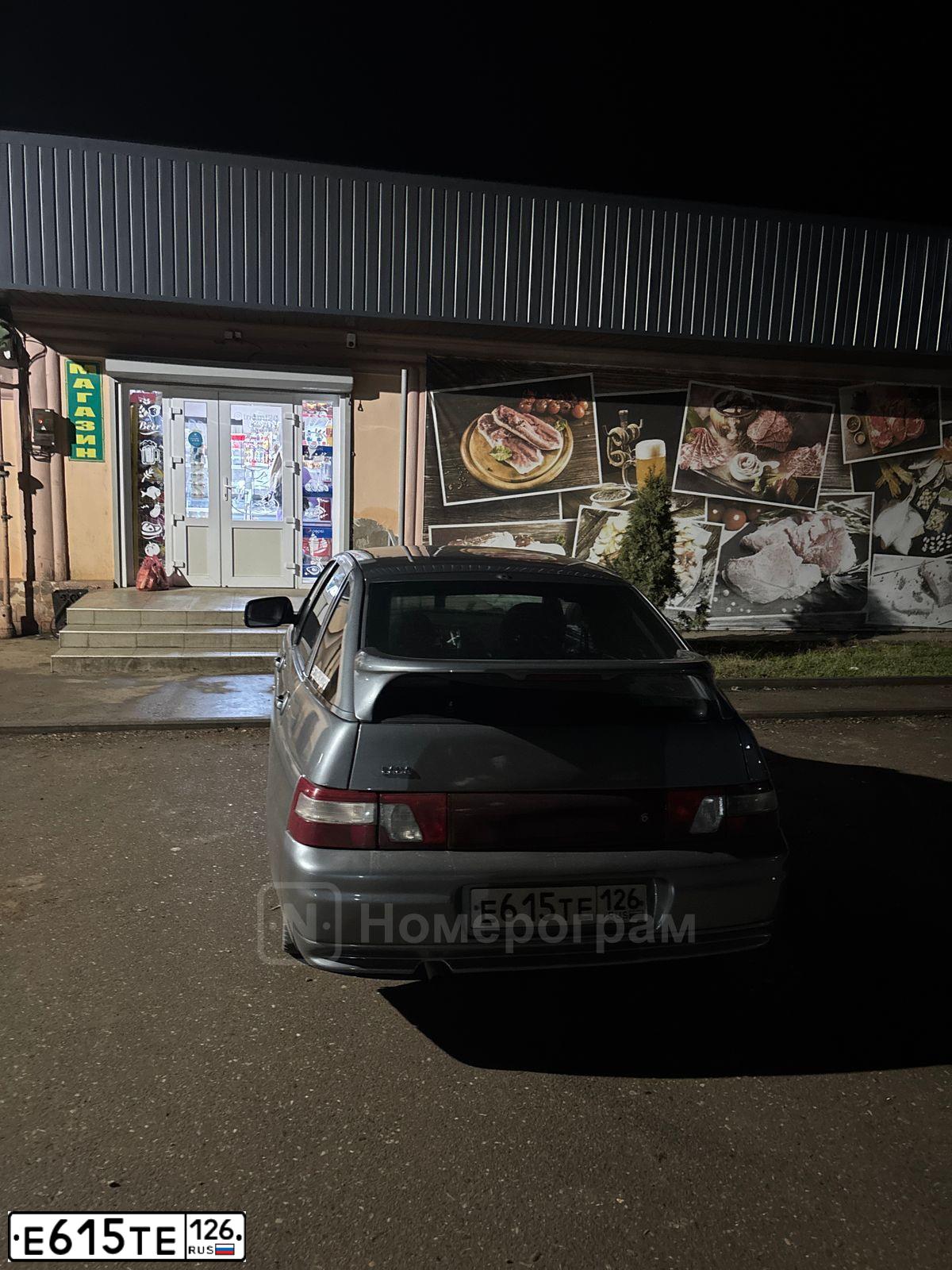 Фото автомобиля LADA 2112 LADA, 2007 — госномер Е615ТЕ126. Цвет: СРЕДНИЙ СЕРО-ЗЕЛЕНЫЙ МЕТАЛЛ