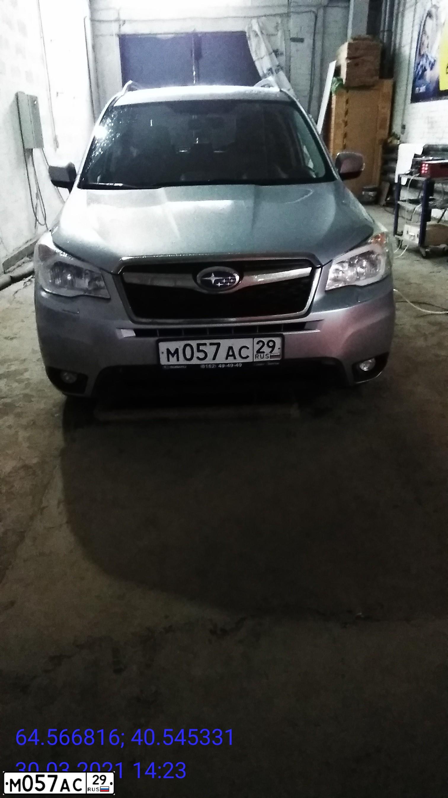 Фото автомобиля SUBARU FORESTER, 2014 — госномер М057АС29. Цвет: СВЕТЛО-СЕРЫЙ