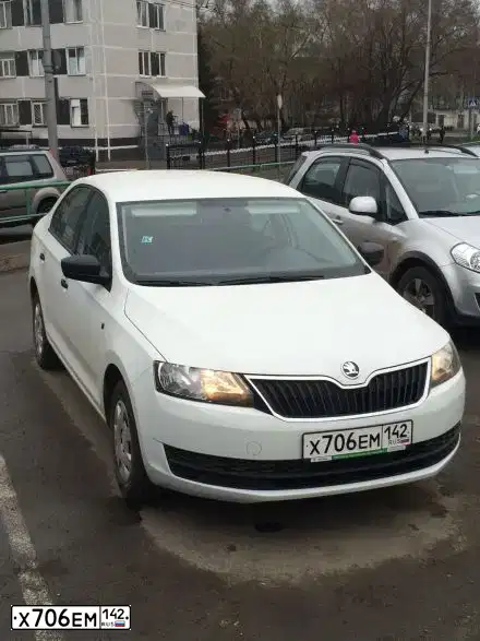 Фото автомобиля SKODA RAPID, 2014 — госномер Х706ЕМ142. Цвет: БЕЛЫЙ