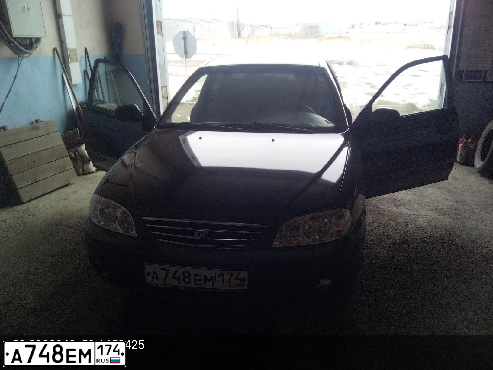 Фото автомобиля KIA SPECTRA, 2008 — госномер А748ЕМ174. Цвет: ЧЕРНЫЙ