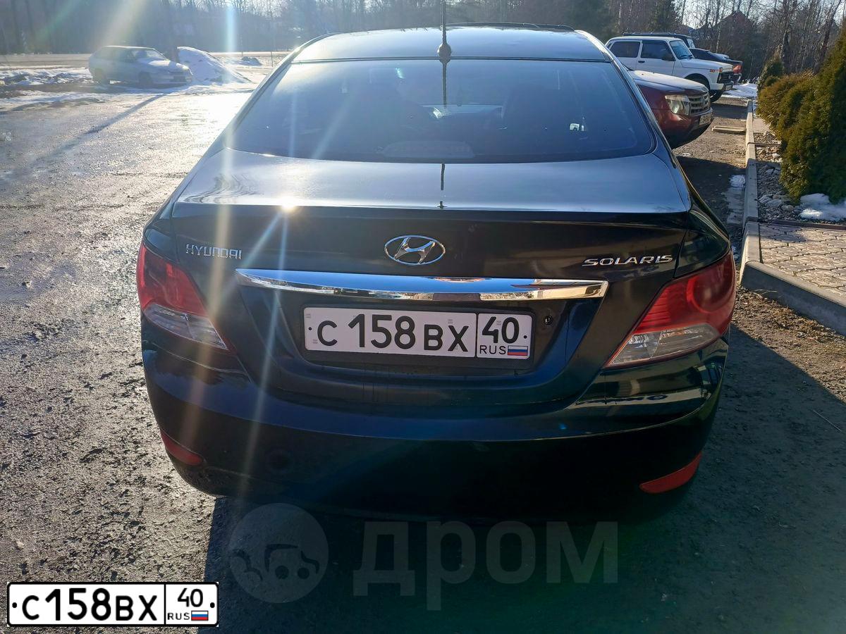 Фото автомобиля HYUNDAI SOLARIS, 2011 — госномер С158ВХ40. Цвет: ЧЕРНЫЙ