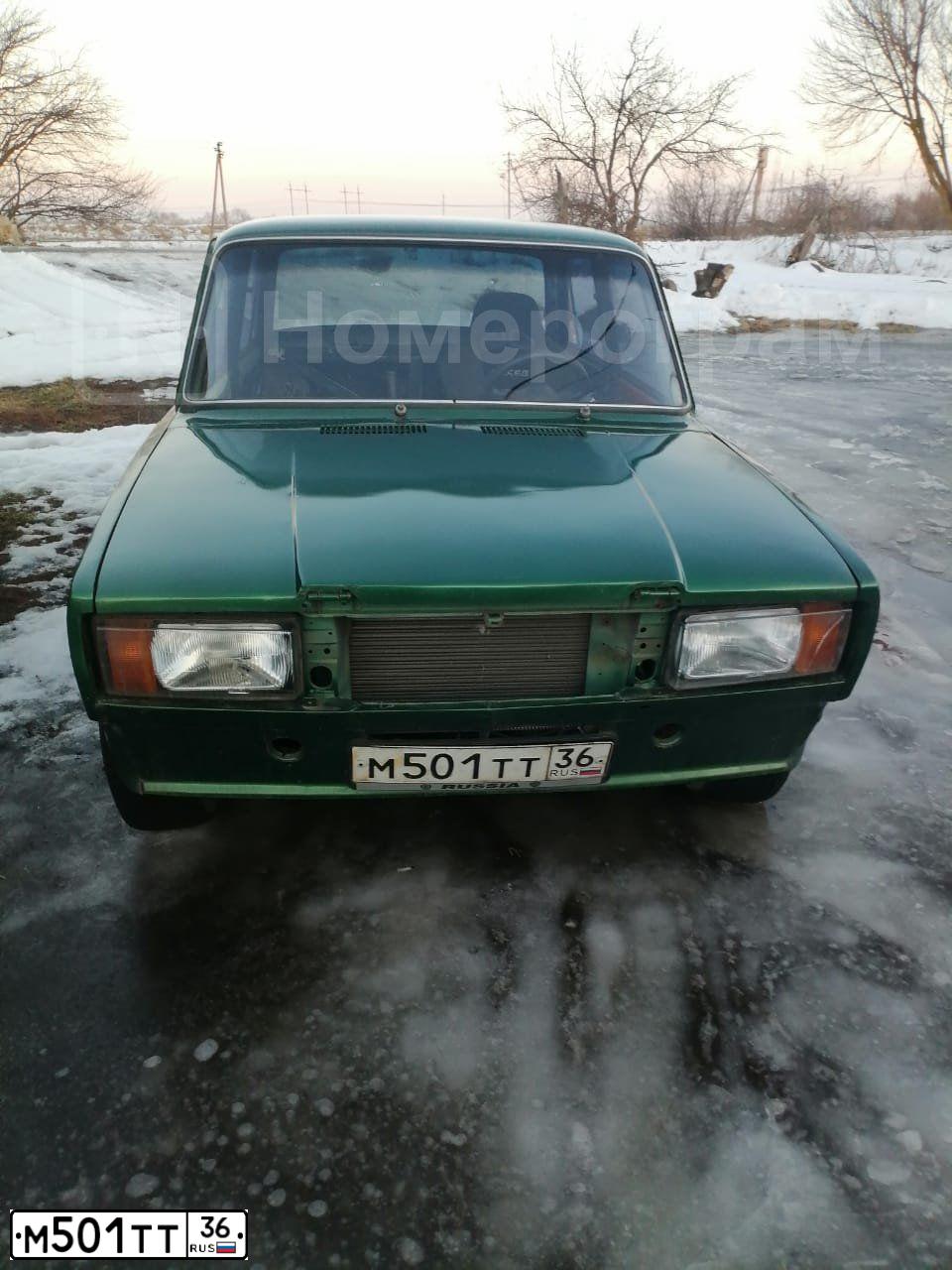 Фото автомобиля LADA 2107, 2002 — госномер М501ТТ36. Цвет: СИНЕ-ЗЕЛЕНЫЙ