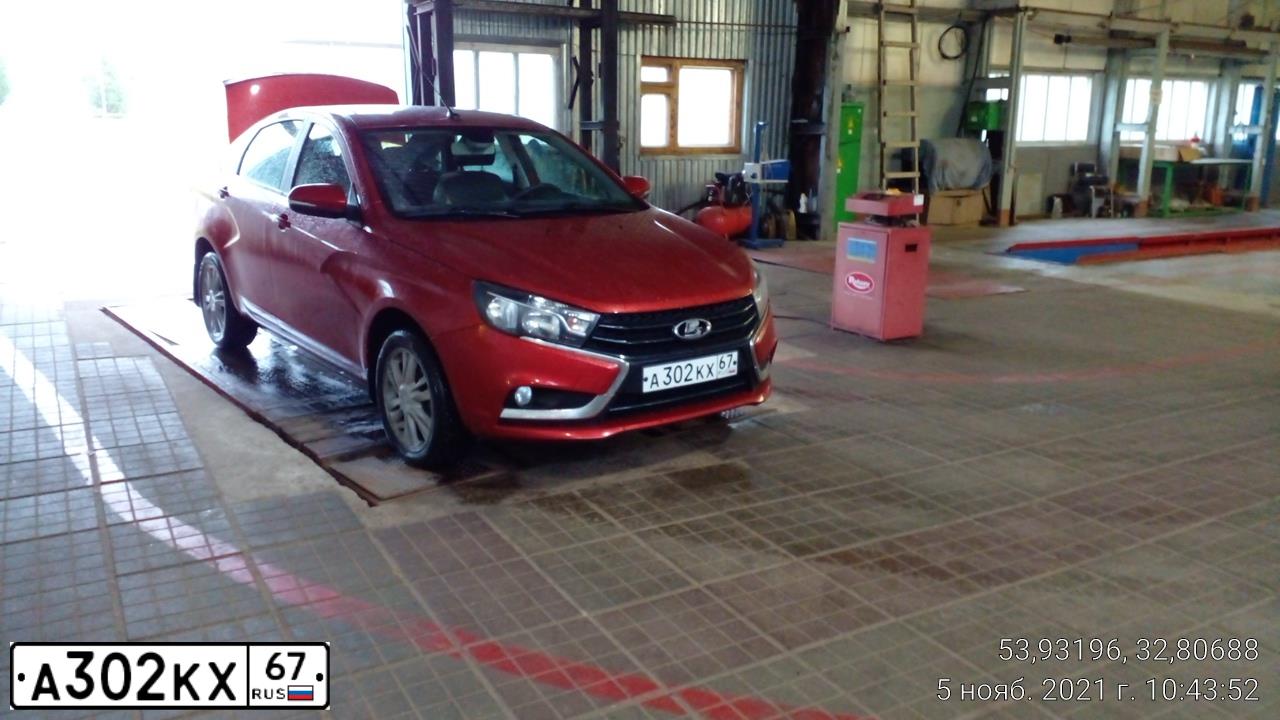 Фото автомобиля LADA VESTA, 2018 — госномер А302КХ67. Цвет: КРАСНЫЙ