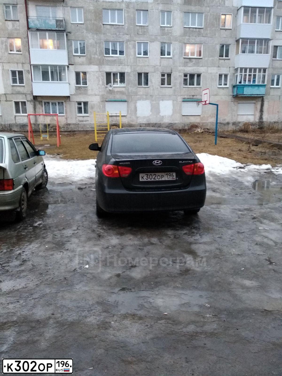 Фото автомобиля HYUNDAI ELANTRA, 2009 — госномер К302ОР196. Цвет: ЧЕРНЫЙ
