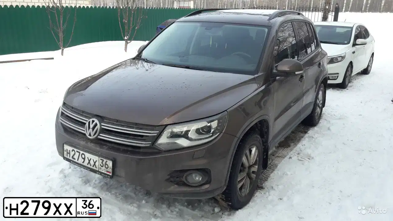 Фото автомобиля VOLKSWAGEN TIGUAN, 2014 — госномер В007РХ36. Цвет: Коричневый