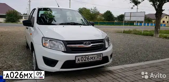 Фото автомобиля LADA 1119 KALINA, 2009 — госномер А026МХ09. Цвет: Белый
