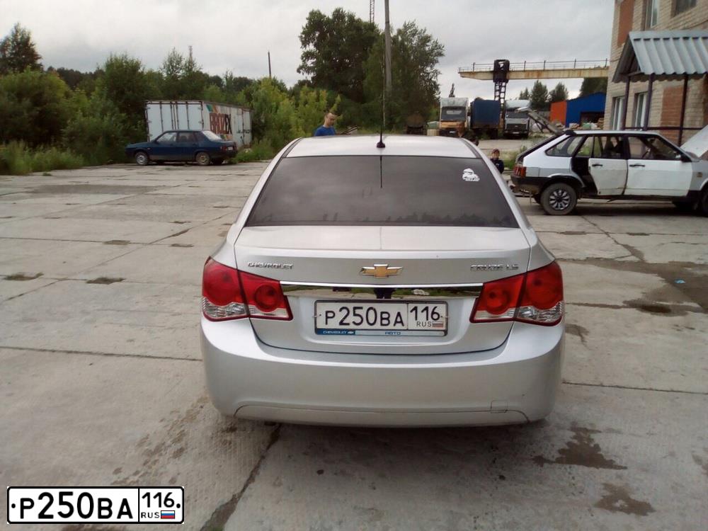 Фото автомобиля CHEVROLET CRUZE, 2011 — госномер Р250ВА116. Цвет: СВЕТЛО-СЕРЫЙ