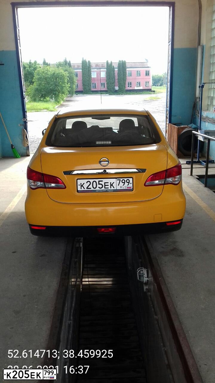 Фото автомобиля NISSAN ALMERA AVTOVAZ, 2017 — госномер К205ЕК799. Цвет: ЖЁЛТЫЙ
