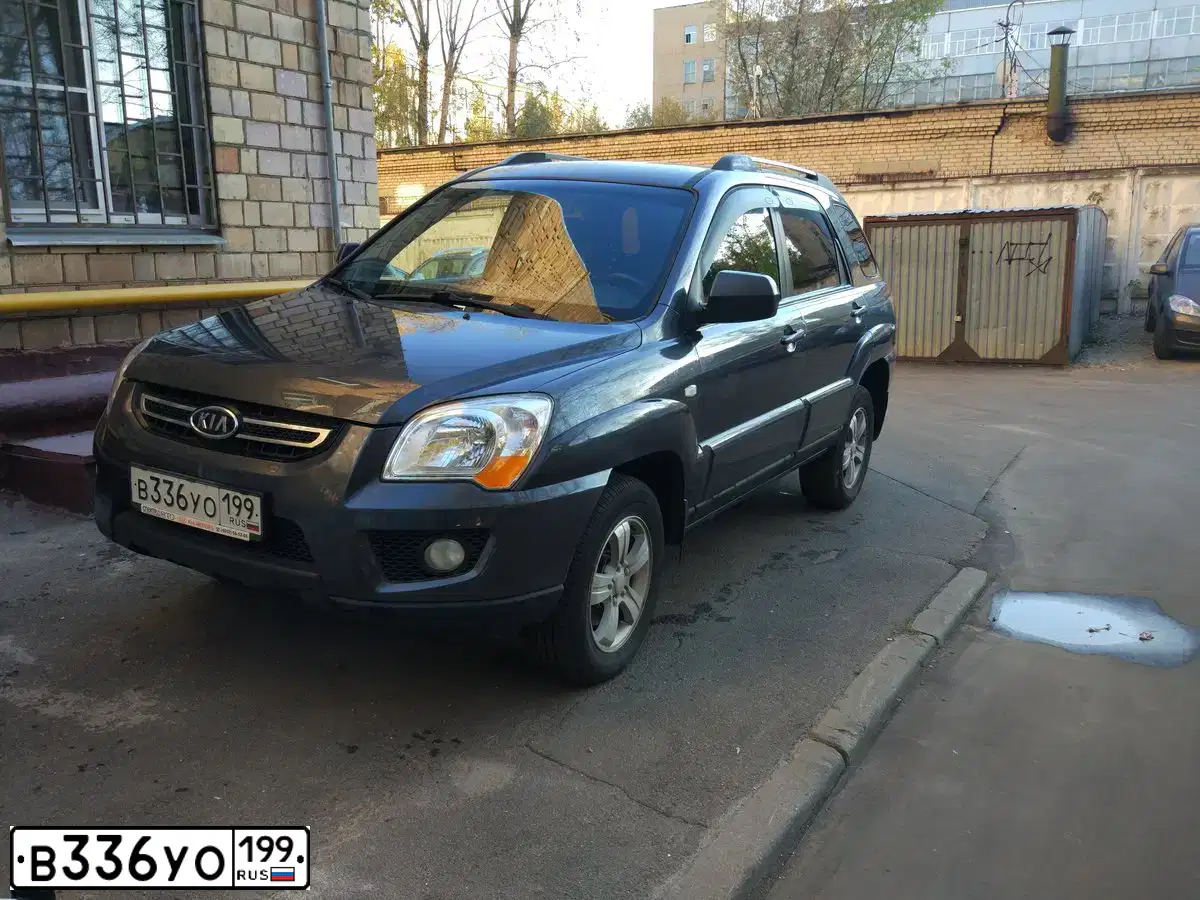 Фото автомобиля KIA SPORTAGE, 2009 — госномер В336УО199. Цвет: СЕРЫЙ