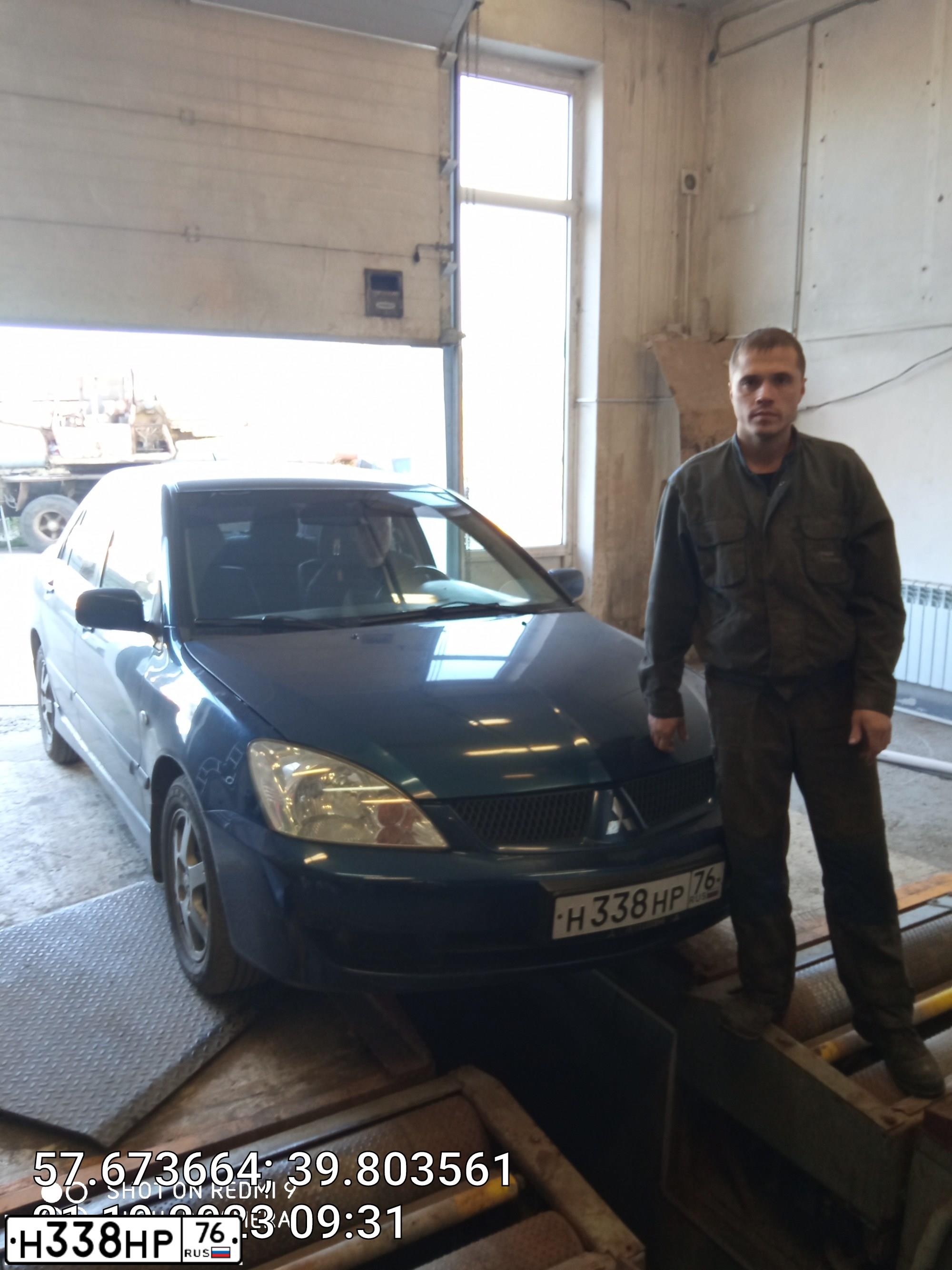 Фото автомобиля MITSUBISHI LANCER, 2006 — госномер Н338НР76. Цвет: синий