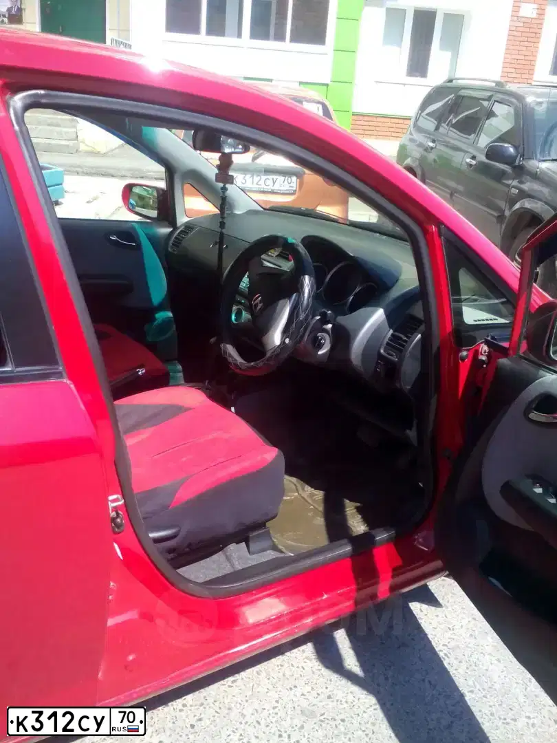Фото автомобиля CHEVROLET SPARK, 2006 — госномер Р497МА177. Цвет: ТЕМНО-ОРАНЖЕВЫЙ