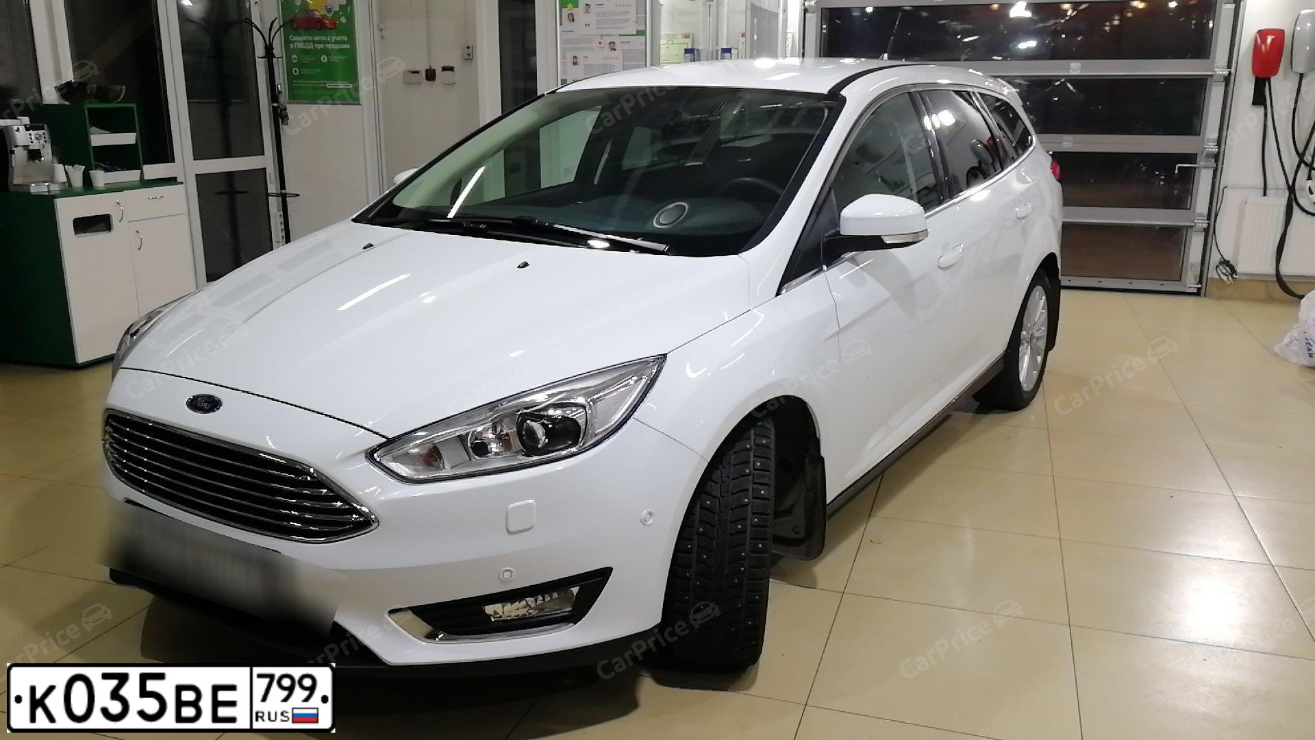 Фото автомобиля FORD FOCUS, 2017 — госномер Х701ТК69. Цвет: Белый
