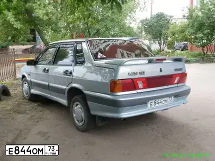 Фото автомобиля LADA 2115 SAMARA, 2004 — госномер М155УВ13. Цвет: ЖЕЛТЫЙ