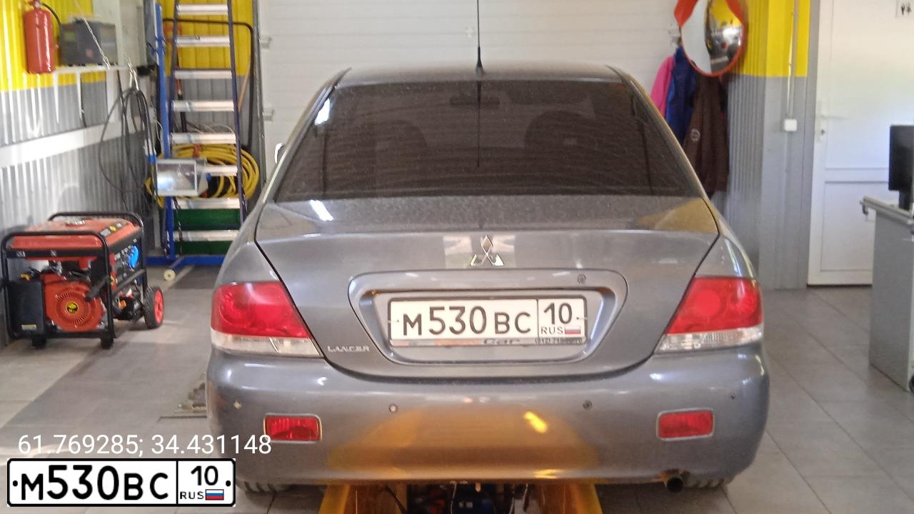 Фото автомобиля MITSUBISHI LANCER, 2006 — госномер М530ВС10. Цвет: СЕРЫЙ