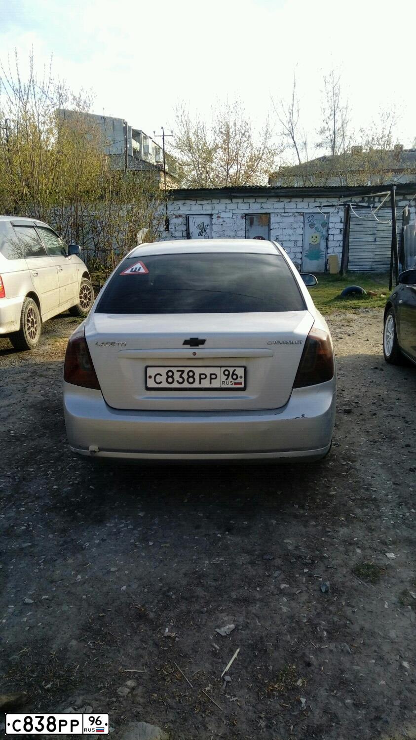 Фото автомобиля CHEVROLET LACETTI, 2007 — госномер К060АС82. Цвет: СВЕТЛО-СЕРЫЙ
