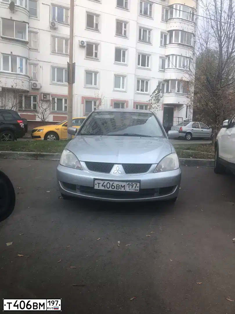 Фото автомобиля MITSUBISHI LANCER, 2007 — госномер Т406ВМ197. Цвет: СЕРЫЙ МЕТАЛЛИК