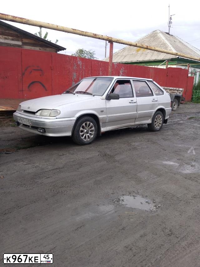 Фото автомобиля LADA 2114 SAMARA, 2004 — госномер К967КЕ45. Цвет: МОЛОЧНО БЕЛЫЙ СЕРЕБР