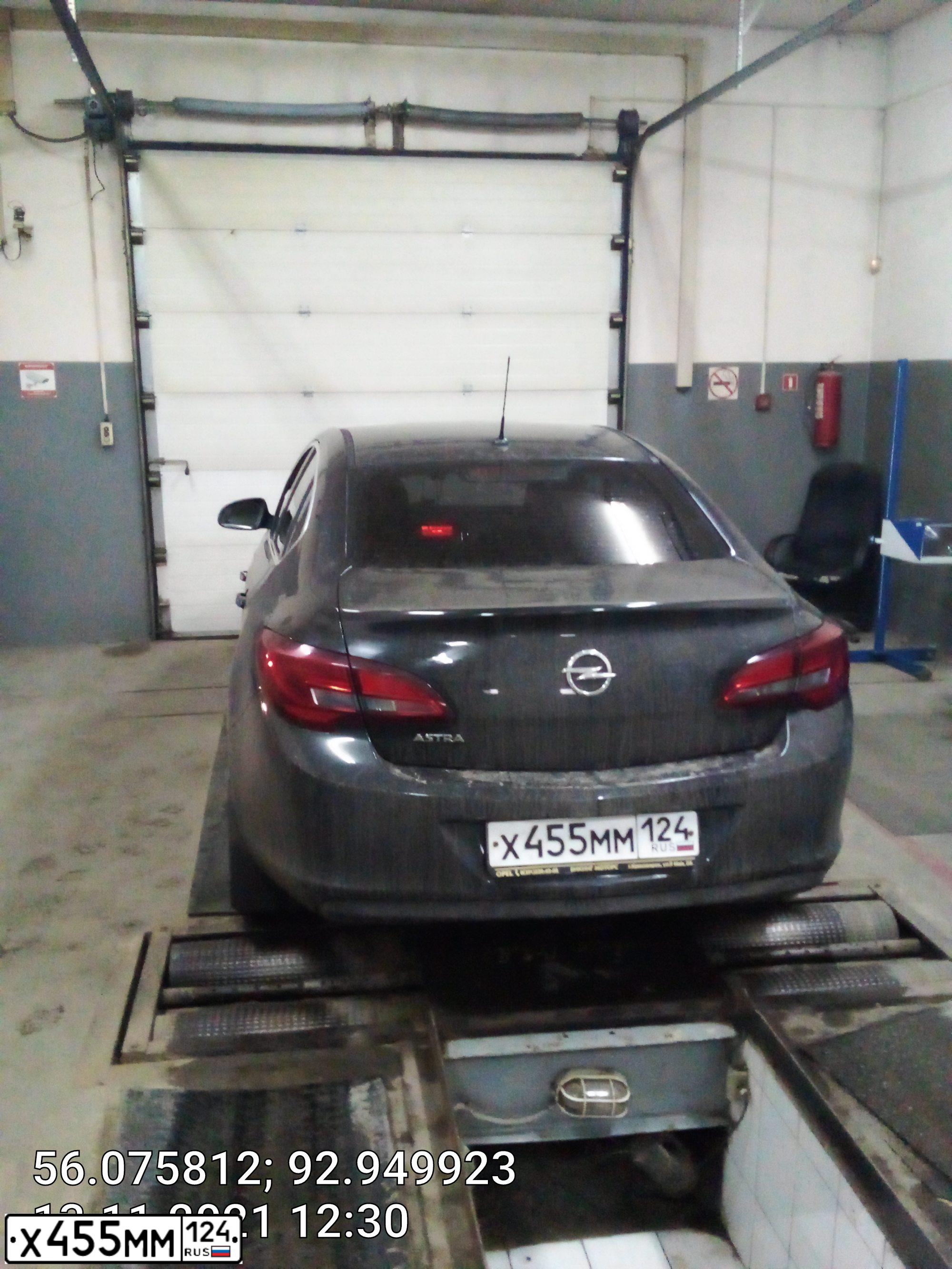 Фото автомобиля OPEL ASTRA, 2013 — госномер Х455ММ124. Цвет: ЧЕРНЫЙ МЕТАЛЛИК
