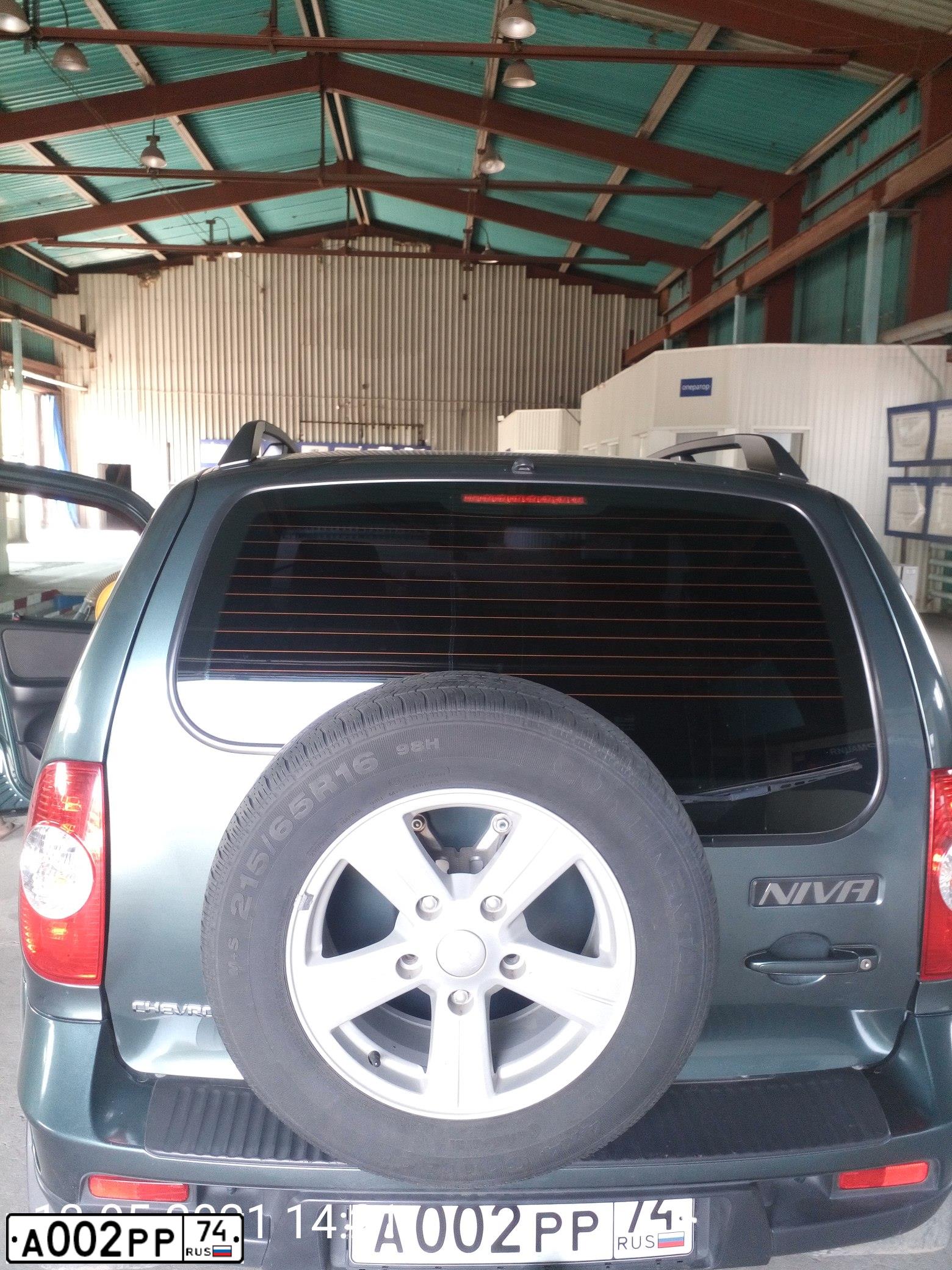Фото автомобиля VOLKSWAGEN TIGUAN, 2013 — госномер А002РР74. Цвет: ЧЕРНЫЙ