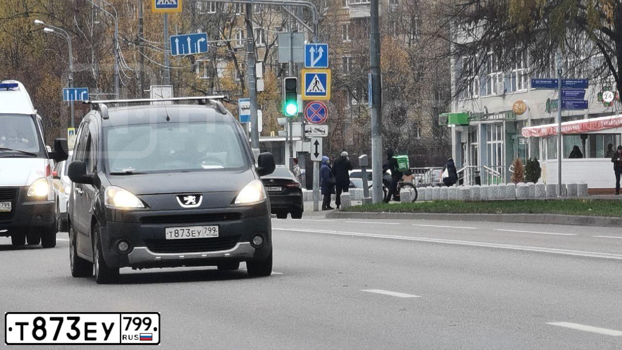 Фото автомобиля PEUGEOT PARTNER, 2011 — госномер Т873ЕУ799. Цвет: ЧЕРНЫЙ