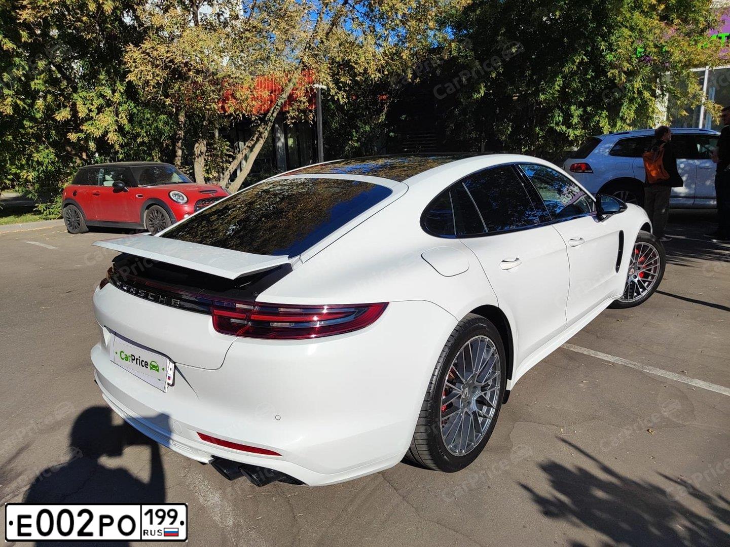 Фото автомобиля PORSCHE PANAMERA, 2010 — госномер Е485НЕ761. Цвет: Белый