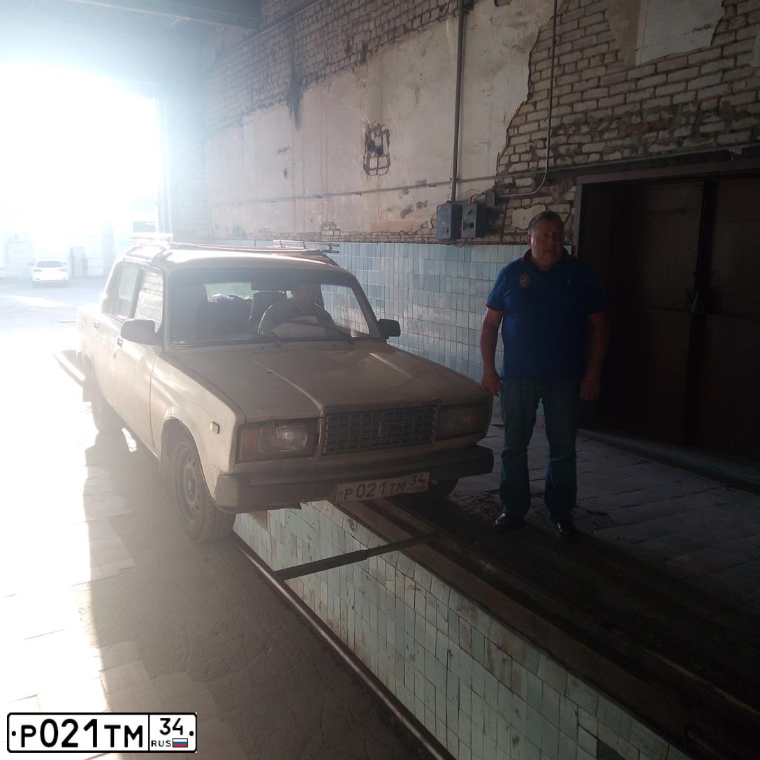 Фото автомобиля LADA 2107 LADA, 2002 — госномер Р021ТМ34. Цвет: ЯРКО БЕЛЫЙ