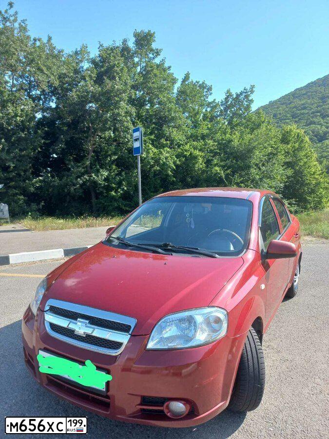 Фото автомобиля CHEVROLET AVEO, 2007 — госномер Р208ВА193. Цвет: Красный