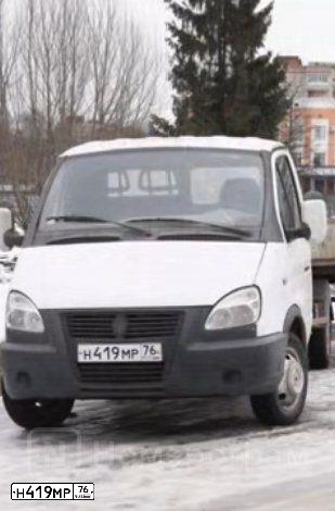 Фото автомобиля ГАЗ 2409, 2005 — госномер Т779АМ550. Цвет: Белый
