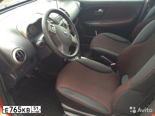 Фото автомобиля NISSAN NOTE, 2008 — госномер Е765КВ51. Цвет: ОРАНЖЕВЫЙ