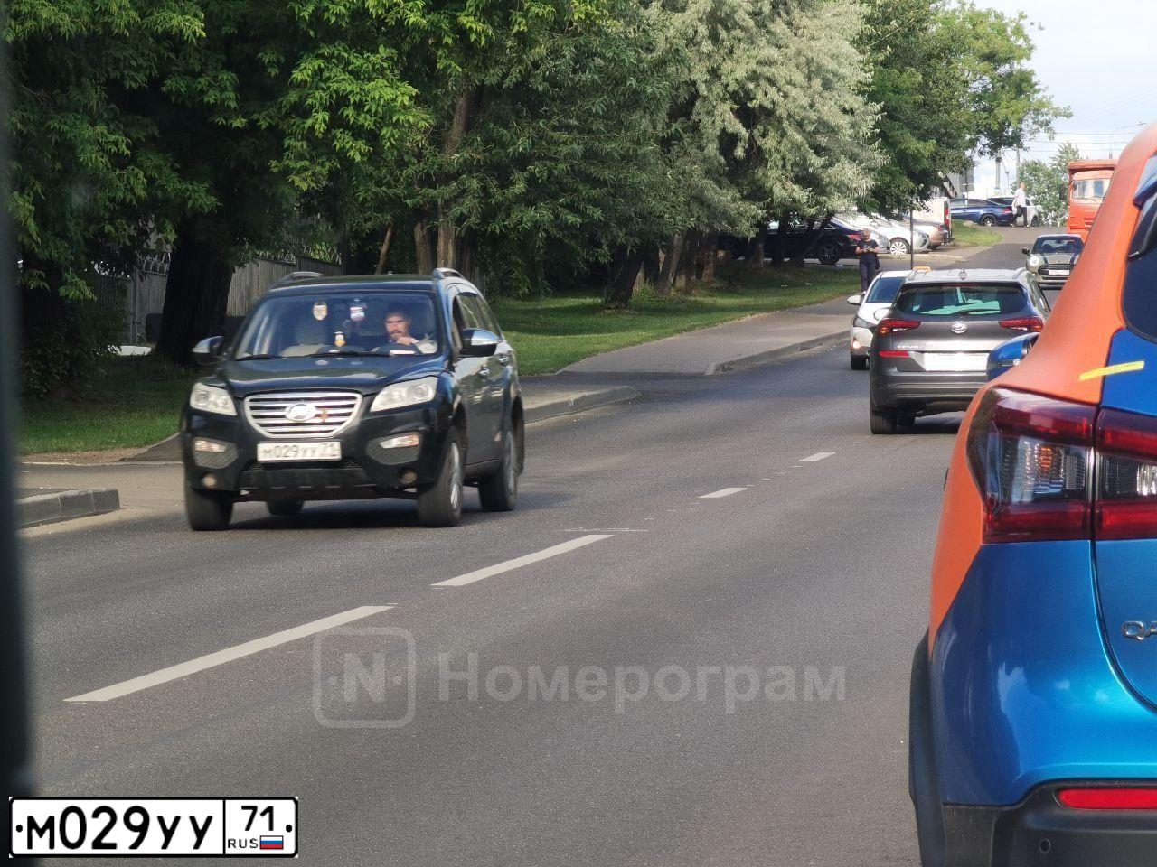 Фото автомобиля LIFAN X 60, 2012 — госномер М029УУ71. Цвет: ЧЕРНЫЙ