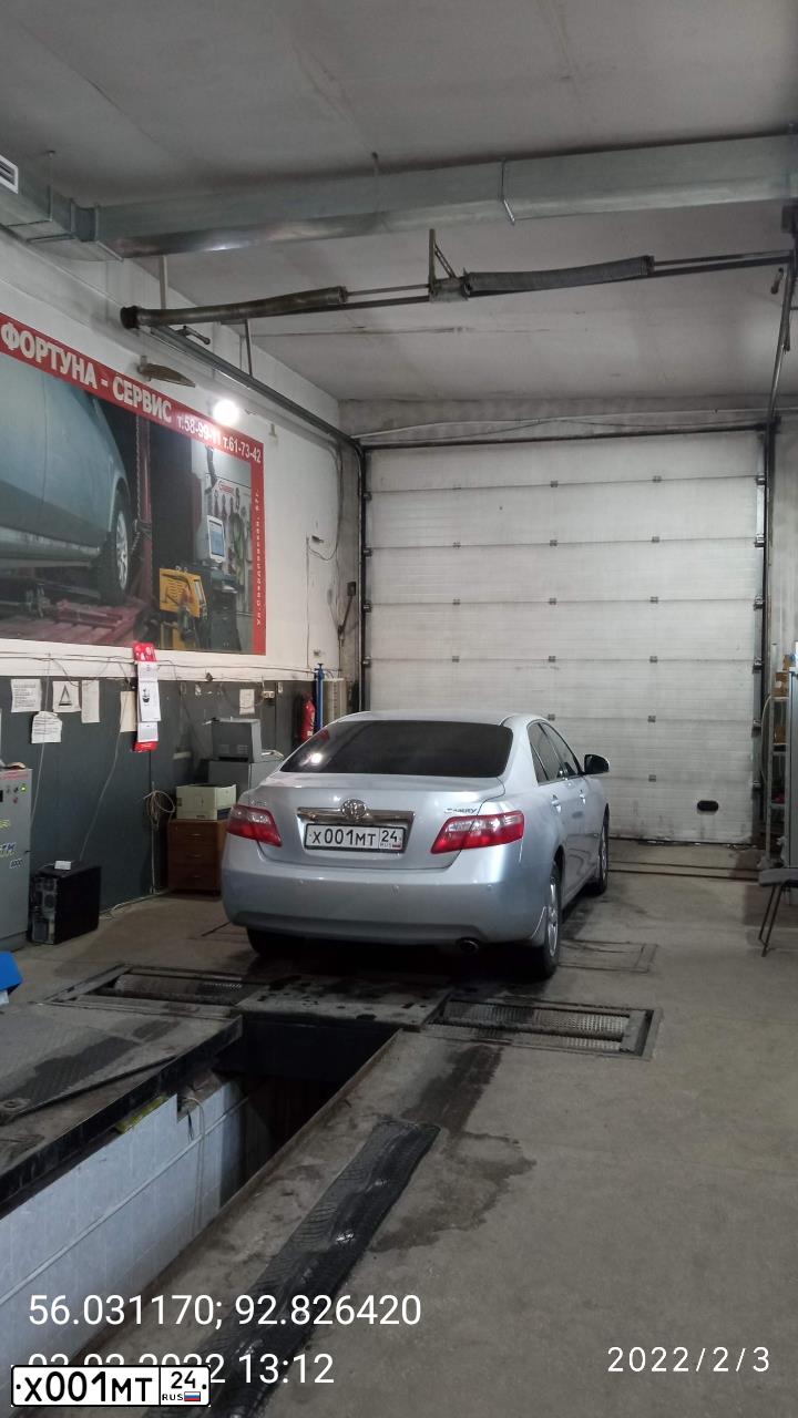 Фото автомобиля GAZ 3110 WOLGA, 2000 — госномер Х001МТ24. Цвет: Белый