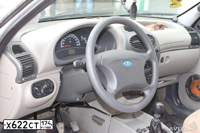 Фото автомобиля LADA 1119 KALINA, 2007 — госномер У900ЕВ174. Цвет: СЕРО-БЕЖЕВЫЙ