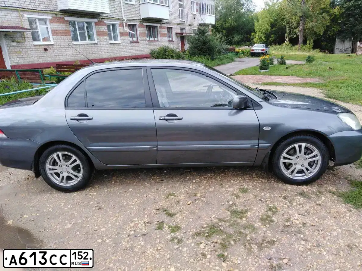 Фото автомобиля MITSUBISHI LANCER, 2006 — госномер А613СС152. Цвет: СЕРЫЙ