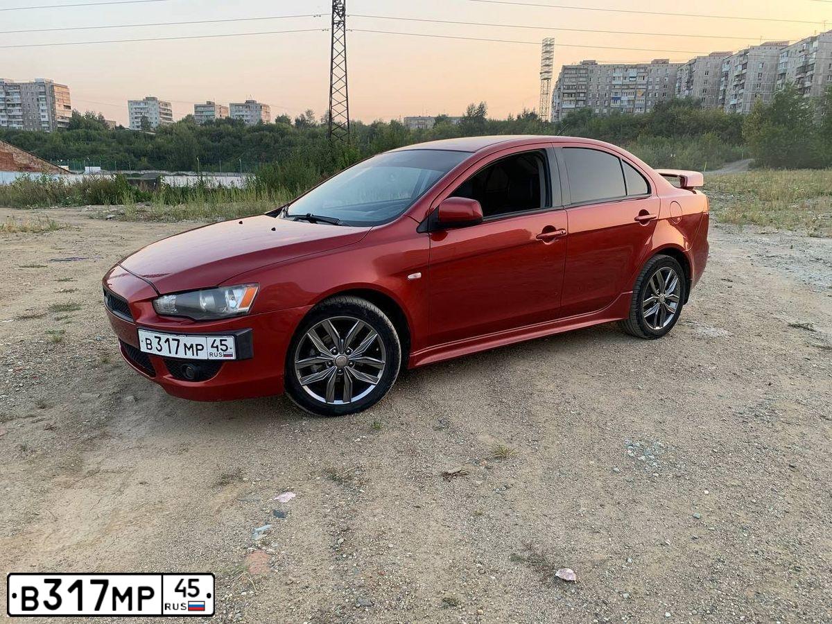 Фото автомобиля MITSUBISHI LANCER, 2007 — госномер Р340ВХ196. Цвет: Красный