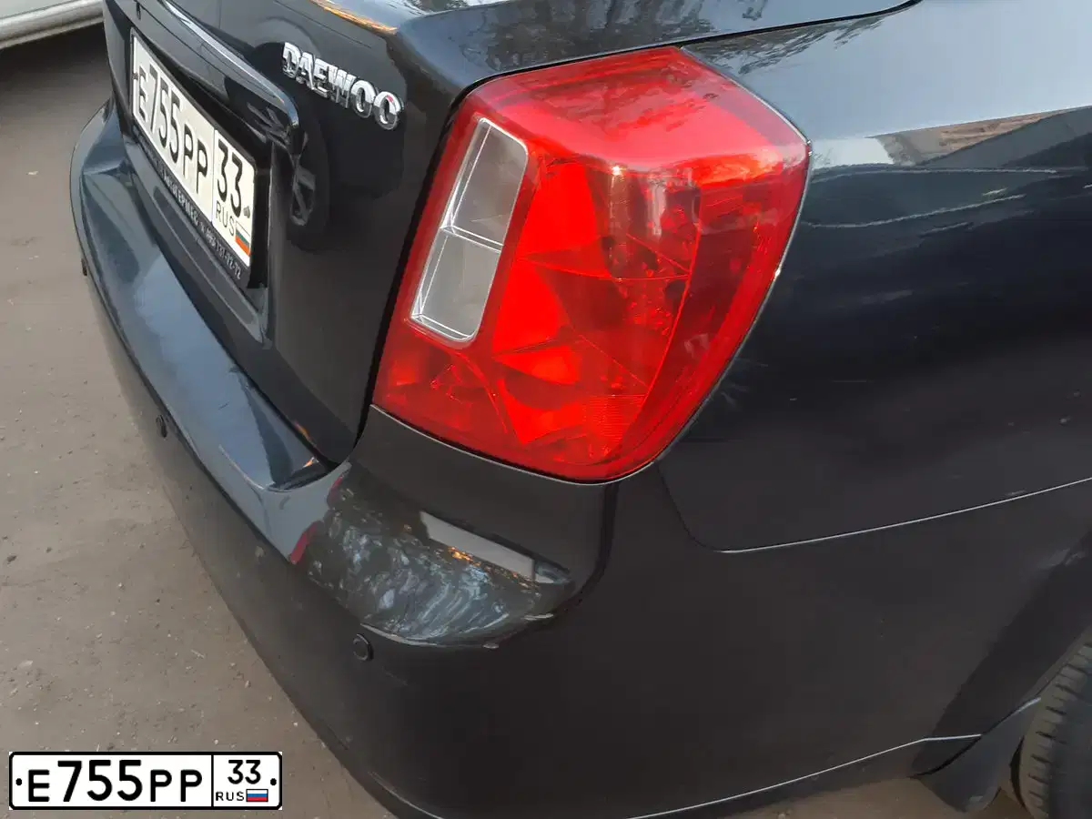 Фото автомобиля DAEWOO GENTRA, 2015 — госномер О053НЕ71. Цвет: Бледно-Черный